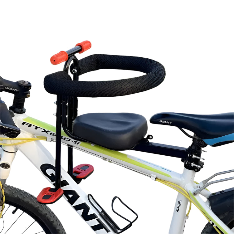 Bicycle with a child seat attachment on a paved path with greenery.